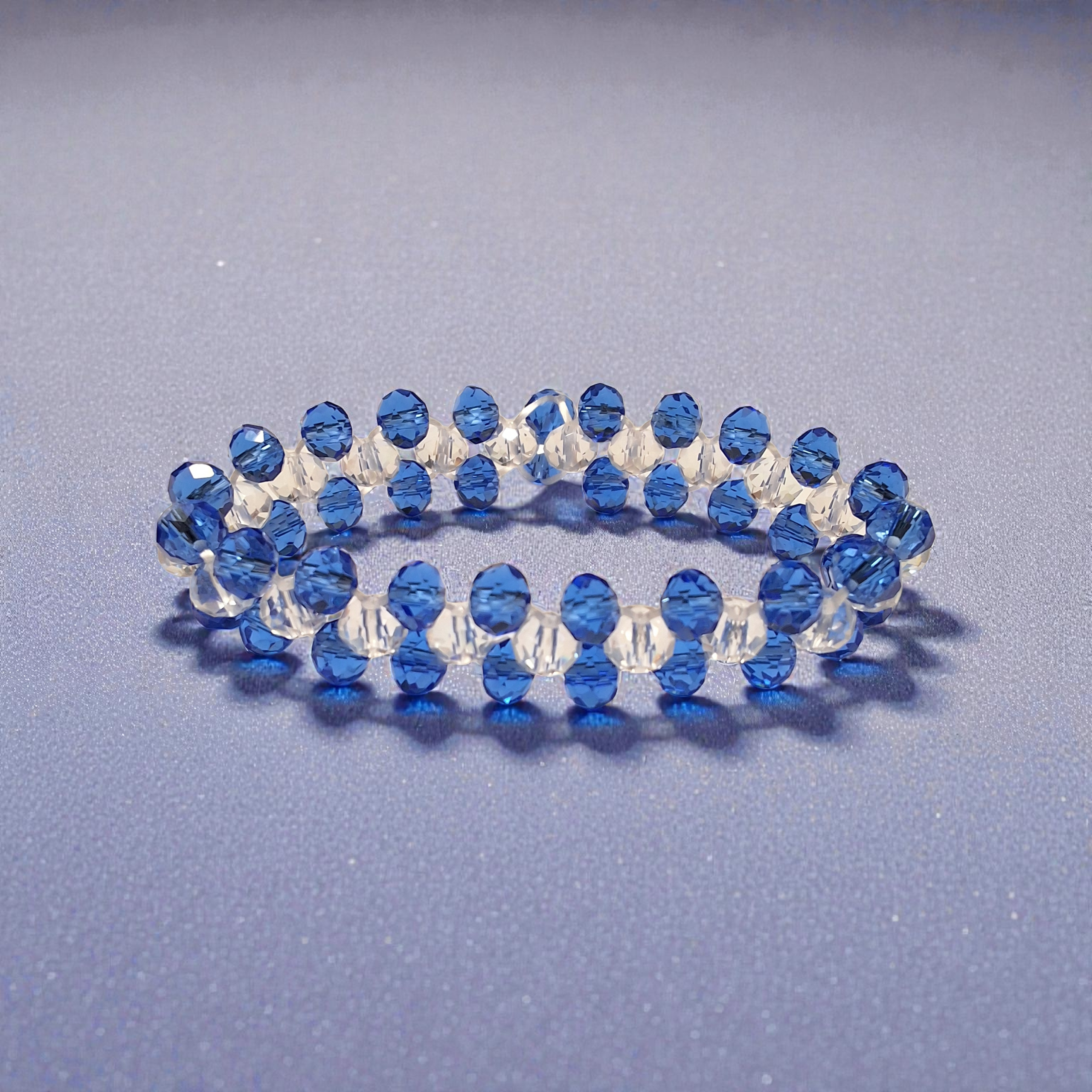 أسوارة كريستال شفاف أزرق ملكي