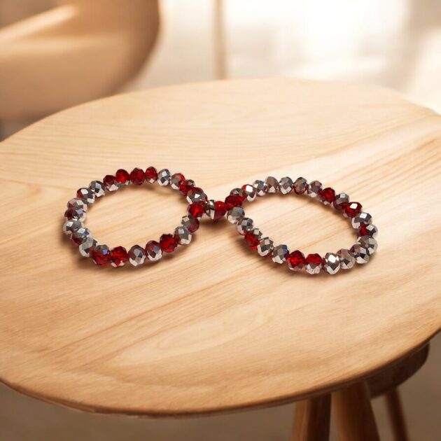 أسوارتين كابلز بناتي فضي وأحمر ياقوتي بتعليقة قلب مغناطيسي