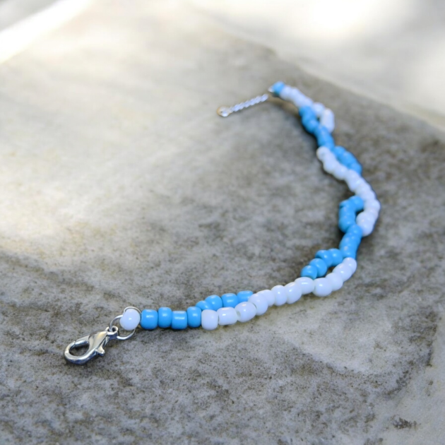 أسوارة ناعمة باللون الفيروزي واللؤلؤي