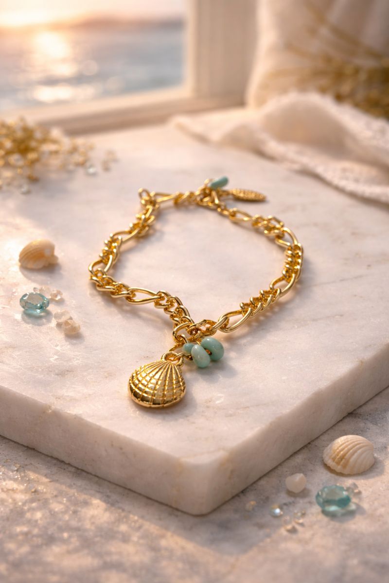 إسوارة سلسلة ذهبية مع صدفة بحر وخرزة تركواز